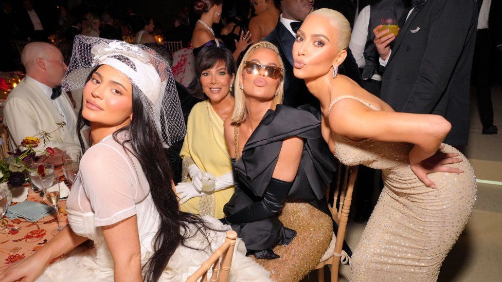 Kardashian-Jenners celebrating their win against Blac Chyna at the Met Gala 2022